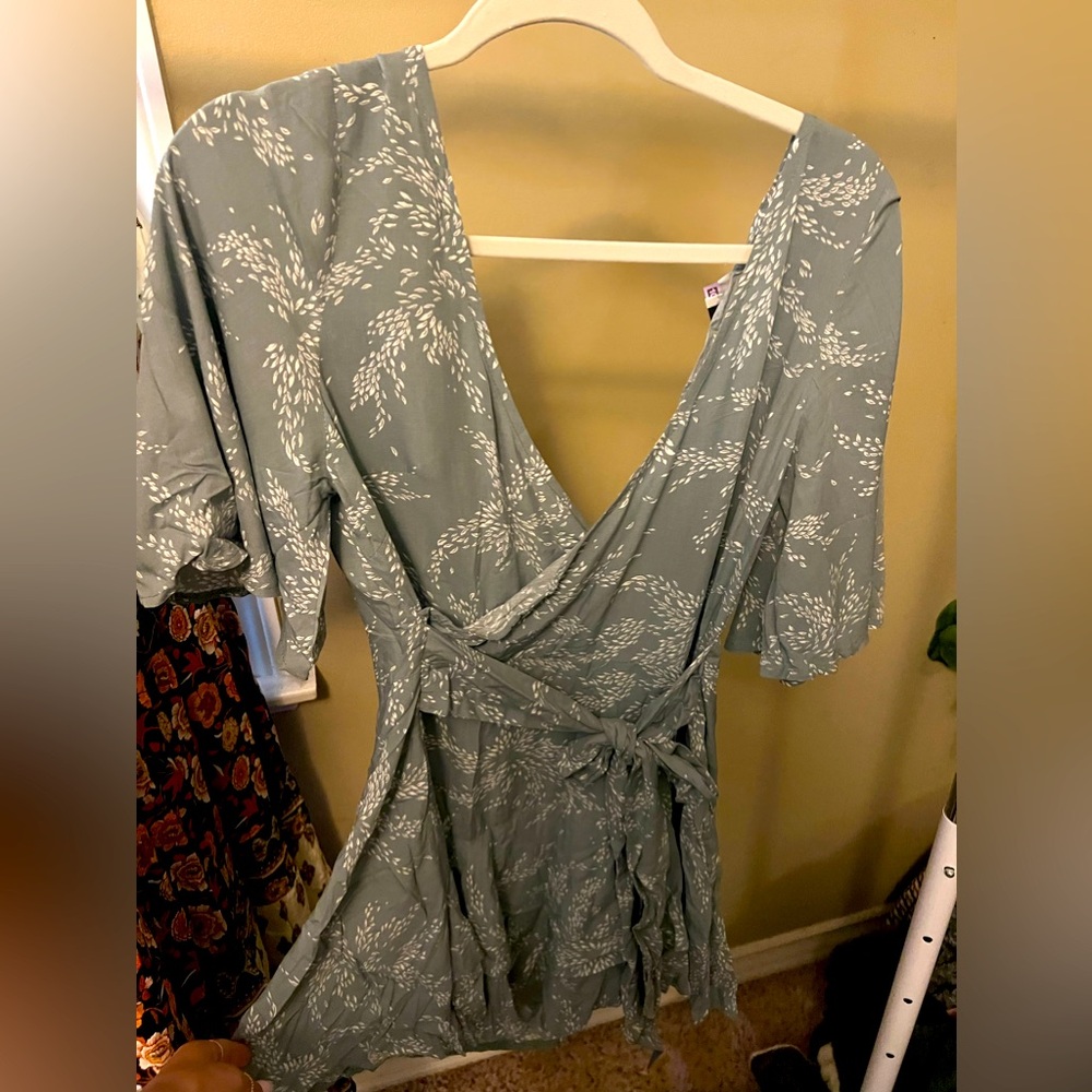 Light blue floral romper.  Size women’s 8.